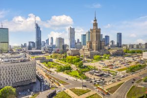 Traffic in Warsaw downtown, aerial view of Palace of Science and Culture and skyscrapers, Poland